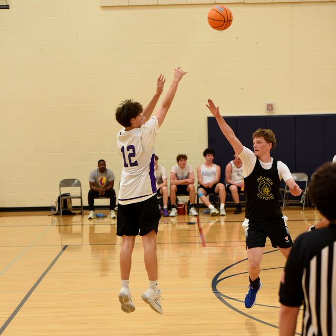 Panthers player rising for a jump shot